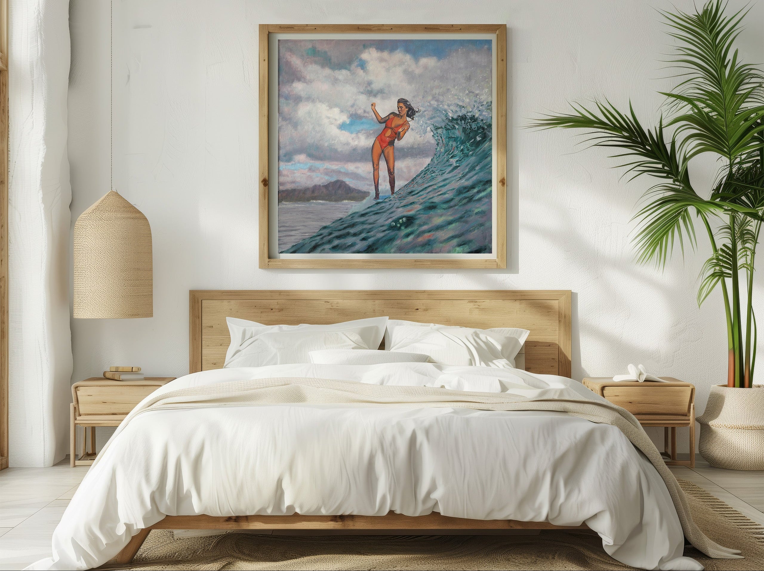 Bedroom with a framed retro vintage style artwork of a female surfer on a wave above the bed in a coastal style bedroom. 